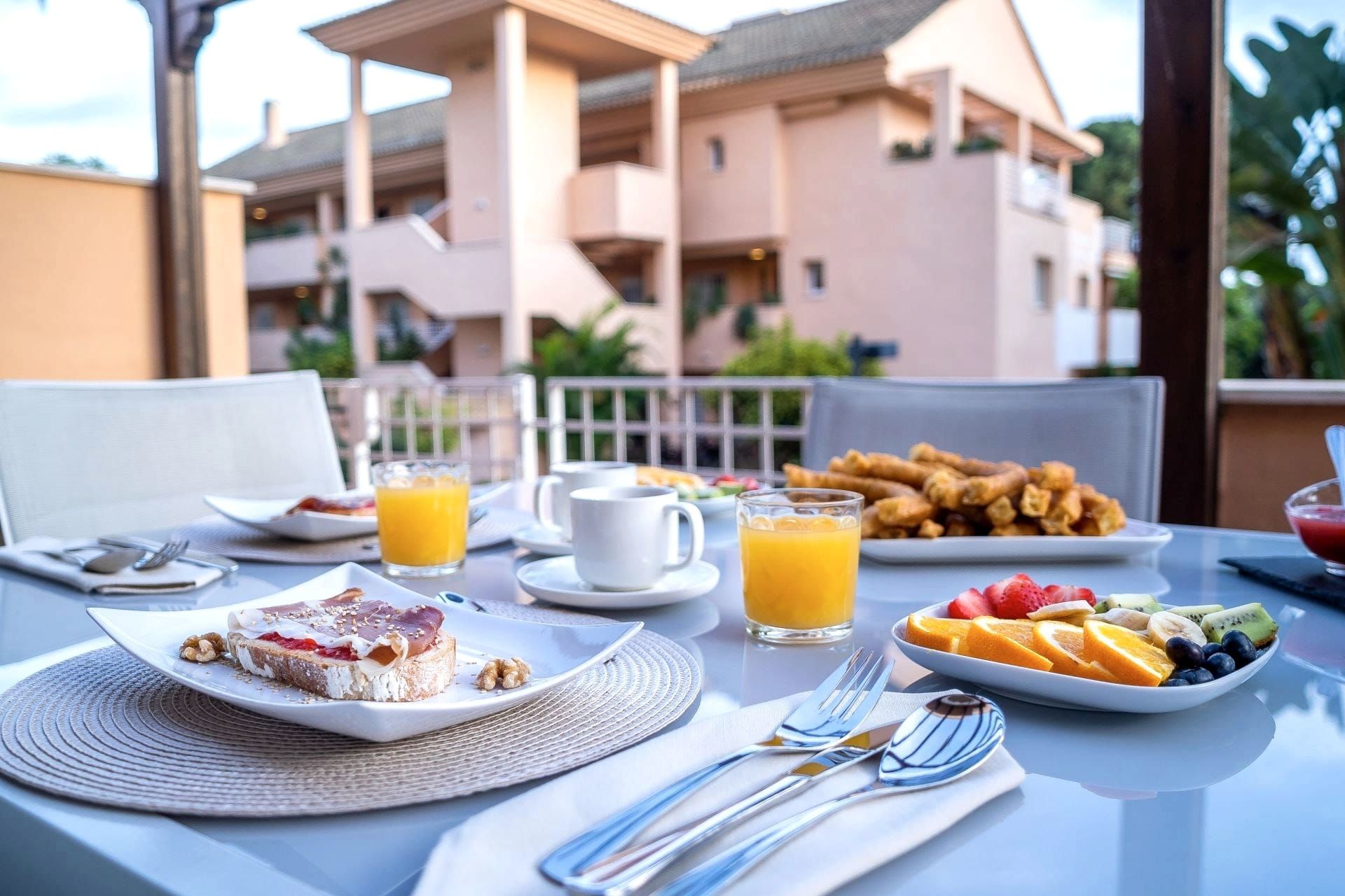 Breakfast with fresh orange juice on the terrace