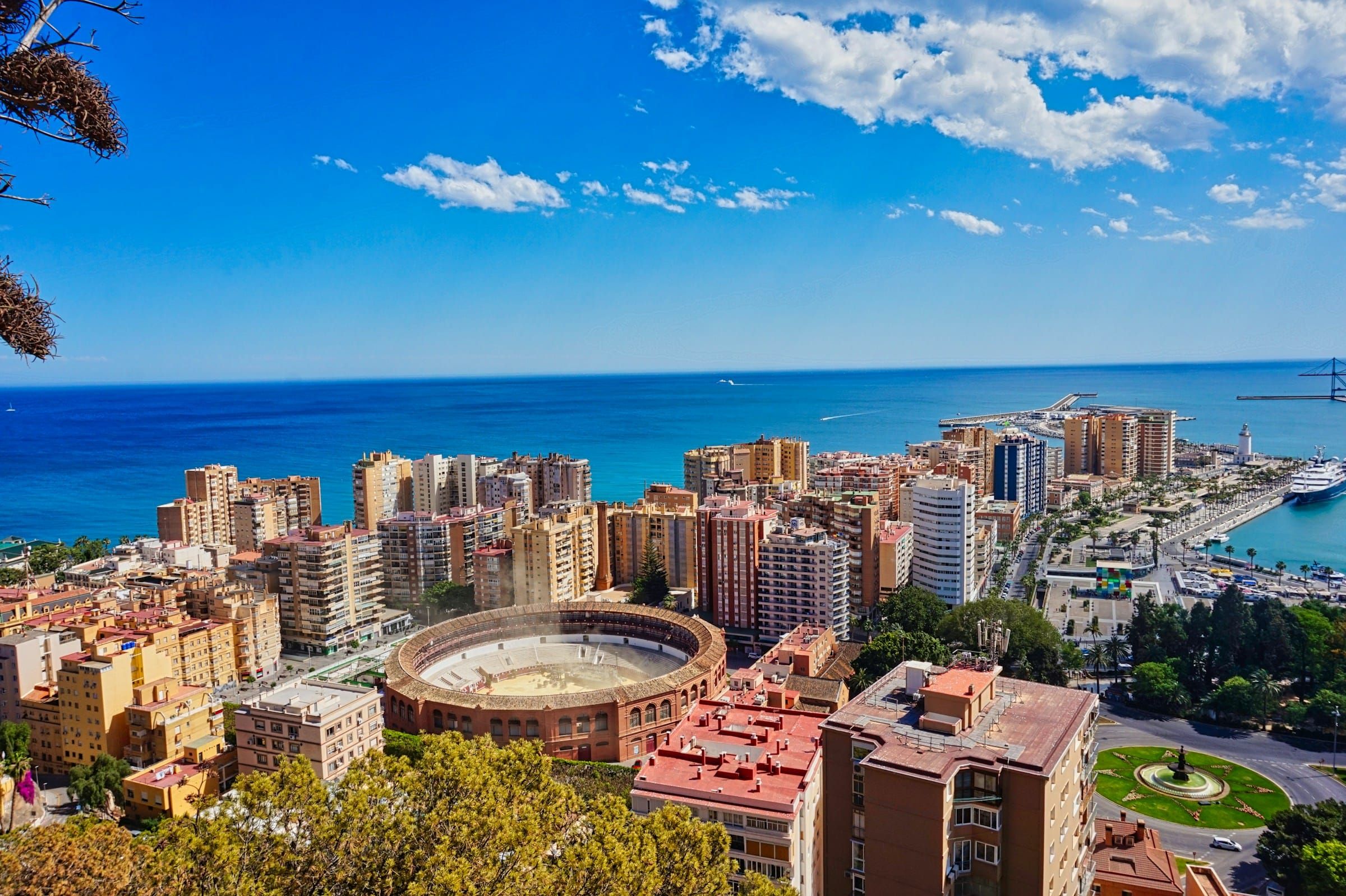 Málaga with the bullring, the port and the sea