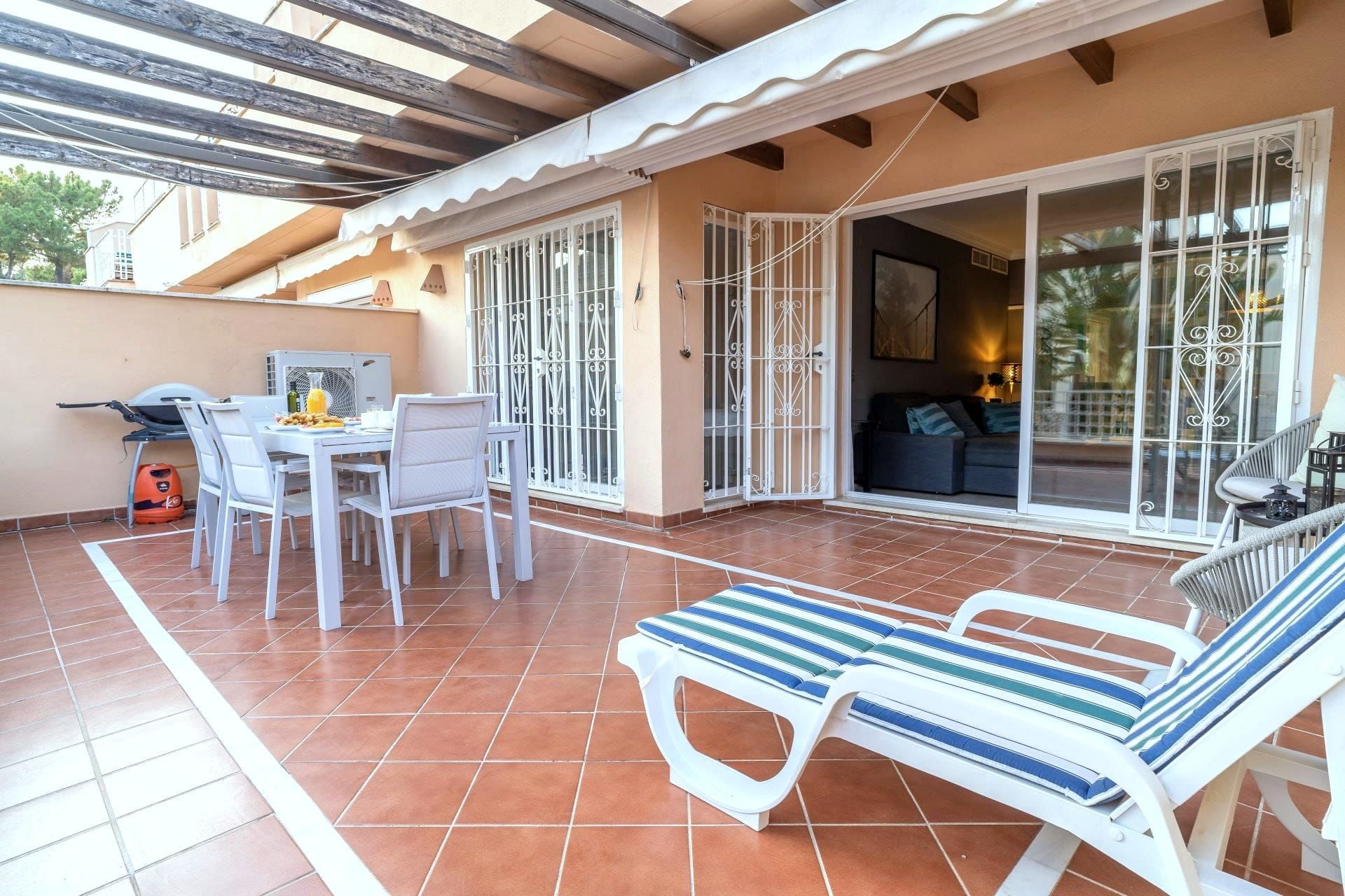 Terrace in front of the living room with sliding doors